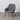 Grauer Sessel mit schwarzen Metallbeinen (65 x 65 x 77 cm)